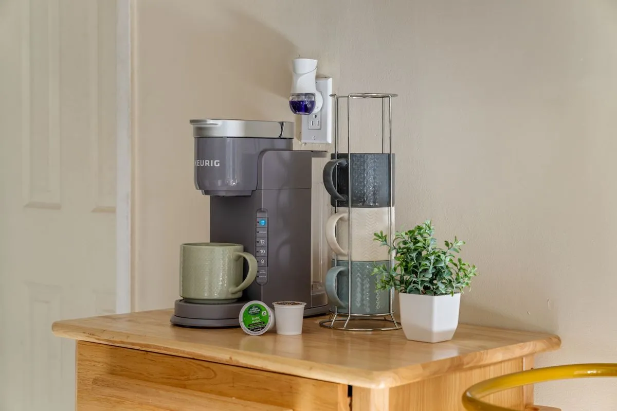 Keurig coffee station with mugs and pods