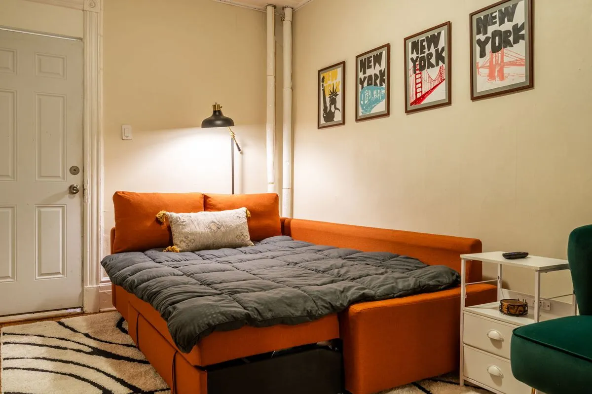 Sectional sofa converted into a full sleeper bed